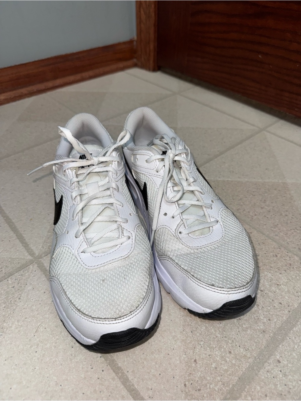 Nike White Athletic Sneakers with Black Swoosh — Women’s